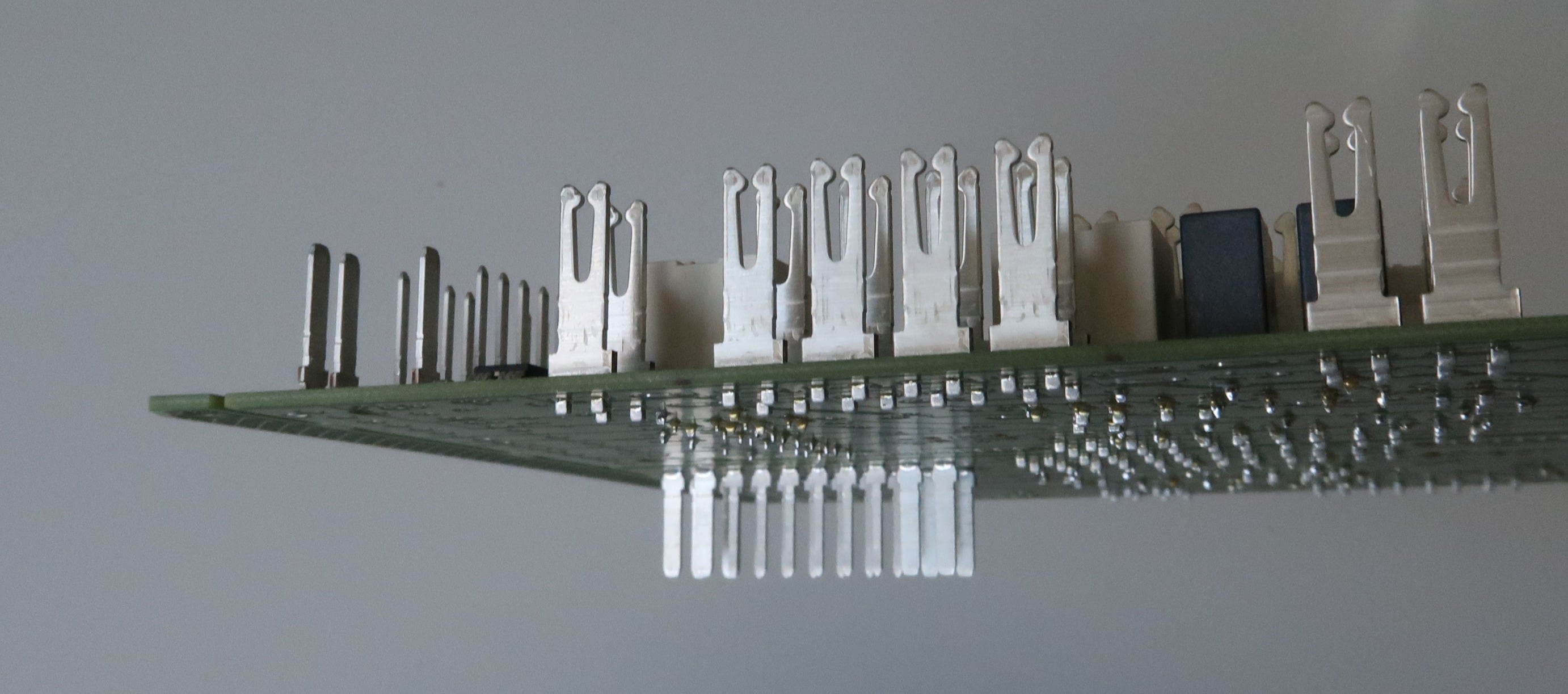 Press-fit connectors need inspection on both top and bottom sides.